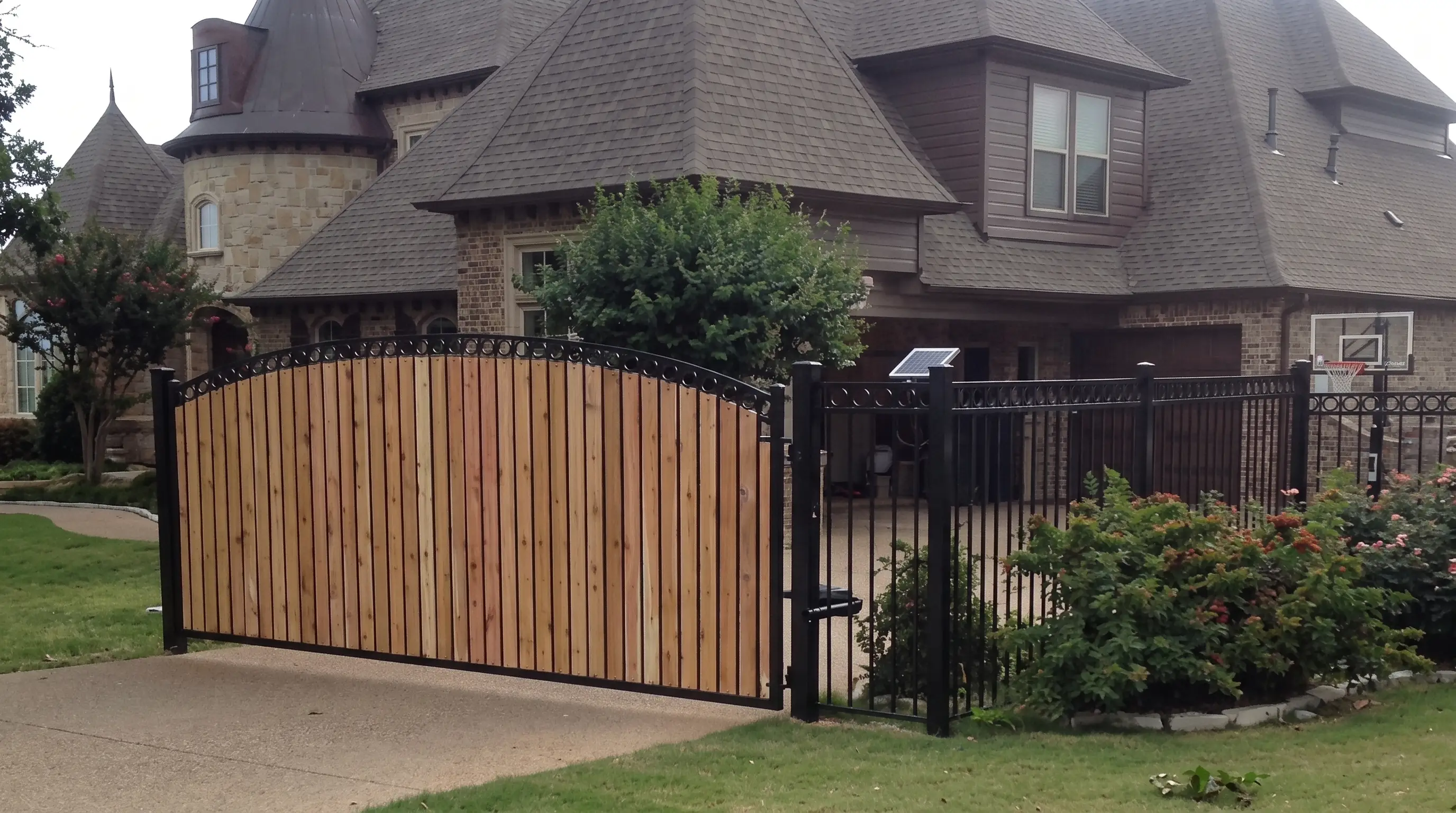 Custom wrought iron driveway gate, estate entry