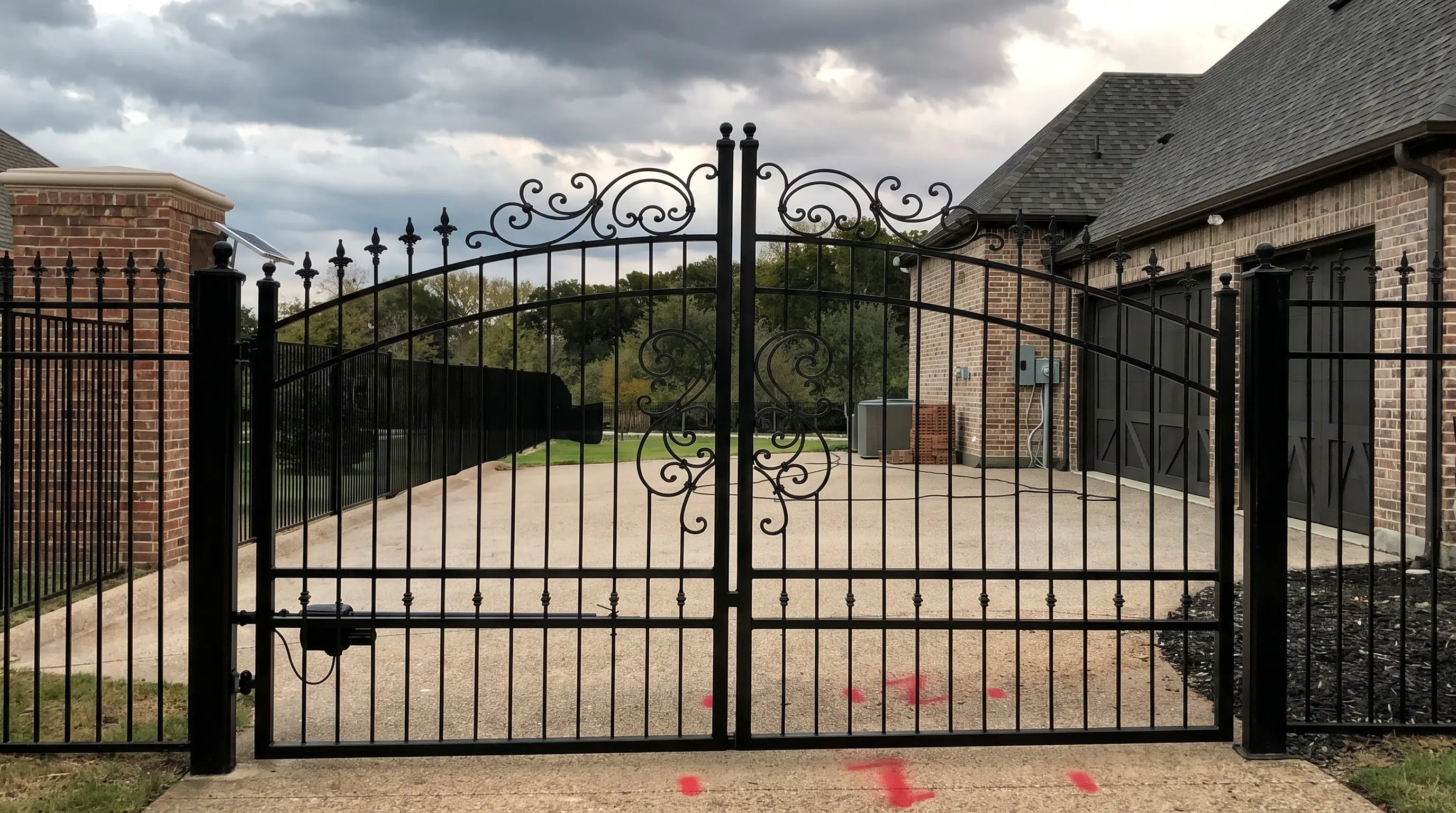 Wrought iron driveway gate, wide entry